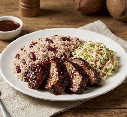 Jerk Pork: Tender pork marinated in a robust jerk sauce and grilled, offering a perfect blend of heat and flavour. 
